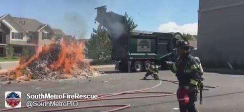 Firefighters battled a trash truck fire Friday afternoon, according to a tweet released by South Metro Fire Rescue.