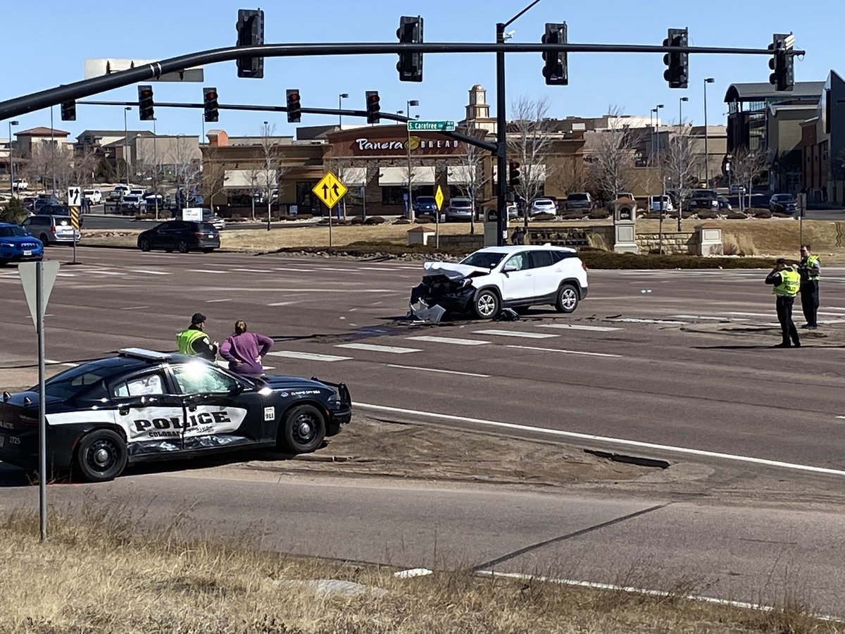 Colorado Springs Police say a person traveling through the intersection failed to yield the right-of-way to the emergency vehicle. This caused a collision in the intersection. The officer was transported to a local hospital for non-life-threatening injuries