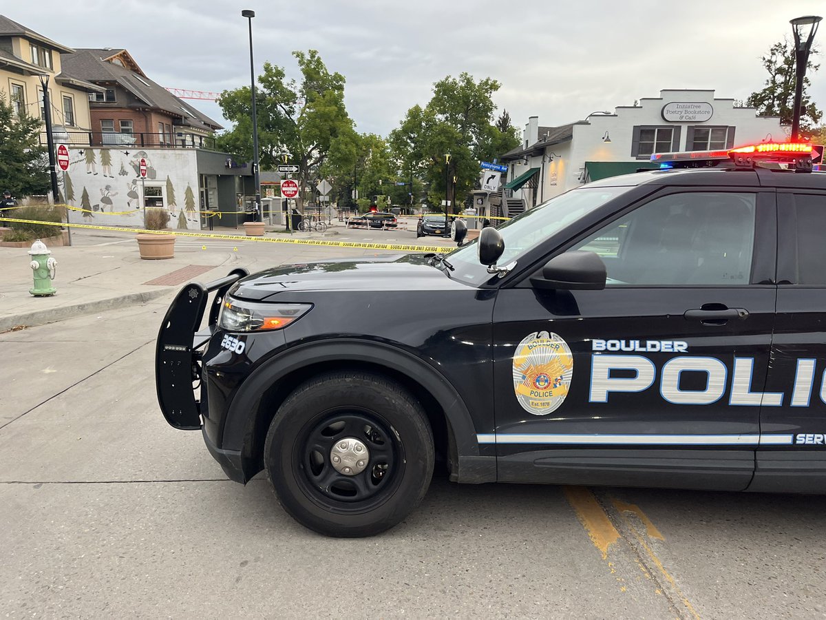 Scene of a shooting that happened right in the middle of Boulder's University Hill overnight.  Two Boulder officers turned a corner to find a group of people shooting, police say. One officer fired, one person in custody, at least 2 other suspects still out there, they say