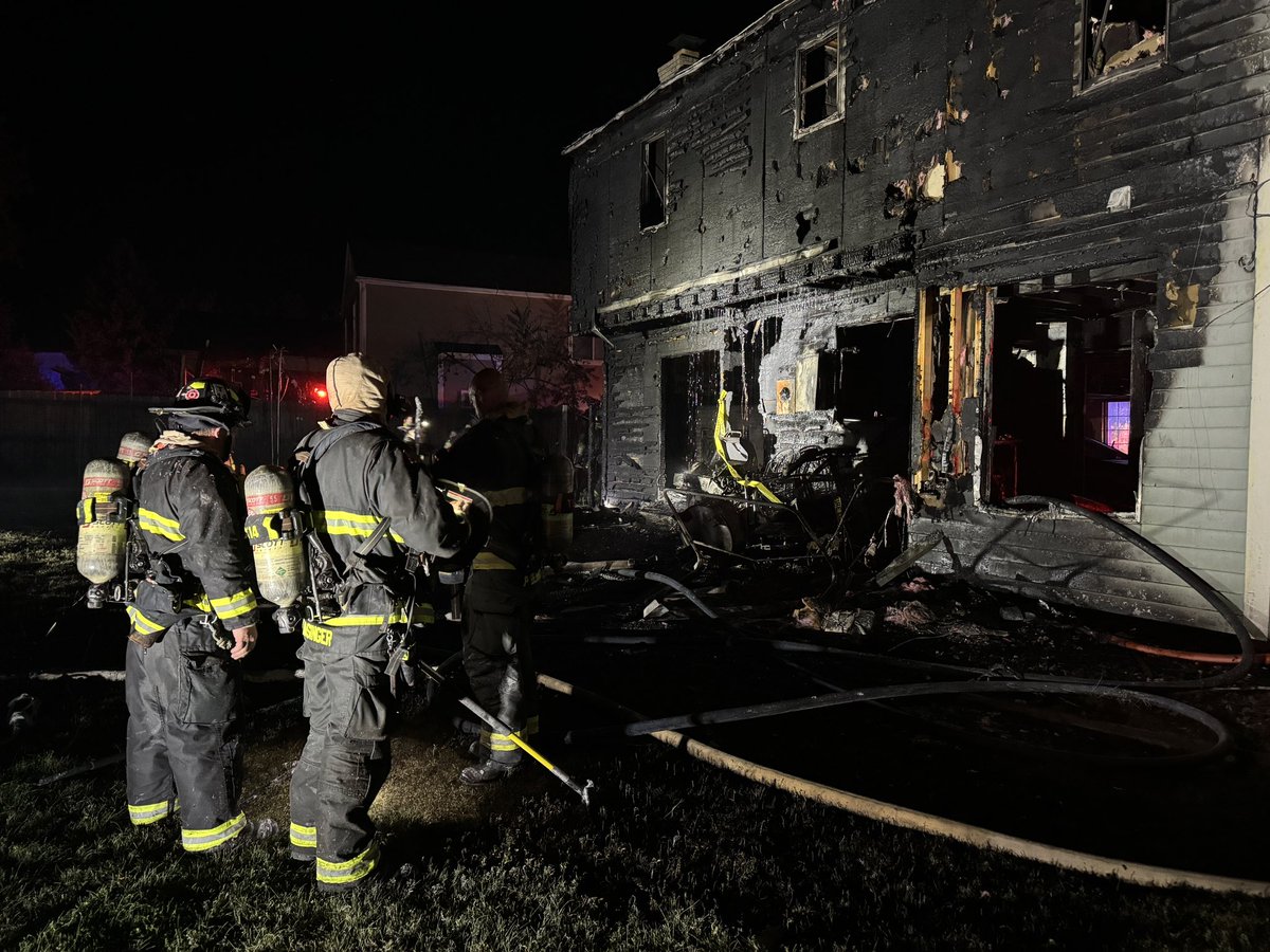 The fire burned through the floor in the family room and caused extensive damage to the first  and  second floor of the structure. There was also some heat exposure to the neighboring house, which melted a portion of the vinyl siding. The cause of the fire is under investigation