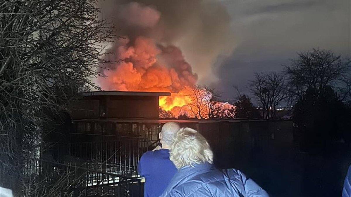 Officials now say that one firefighter was injured during the response to a massive blaze at a construction site for a Denver apartment complex